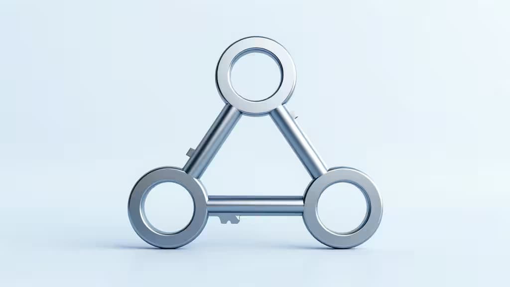 Three interlocking metallic rings form a secure triangle, symbolizing multi-signature crypto wallet protection.
