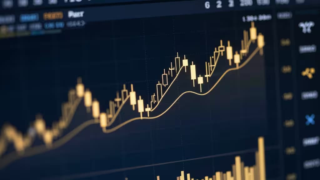 Golden candlestick charts rise sharply on a dark digital trading dashboard screen.