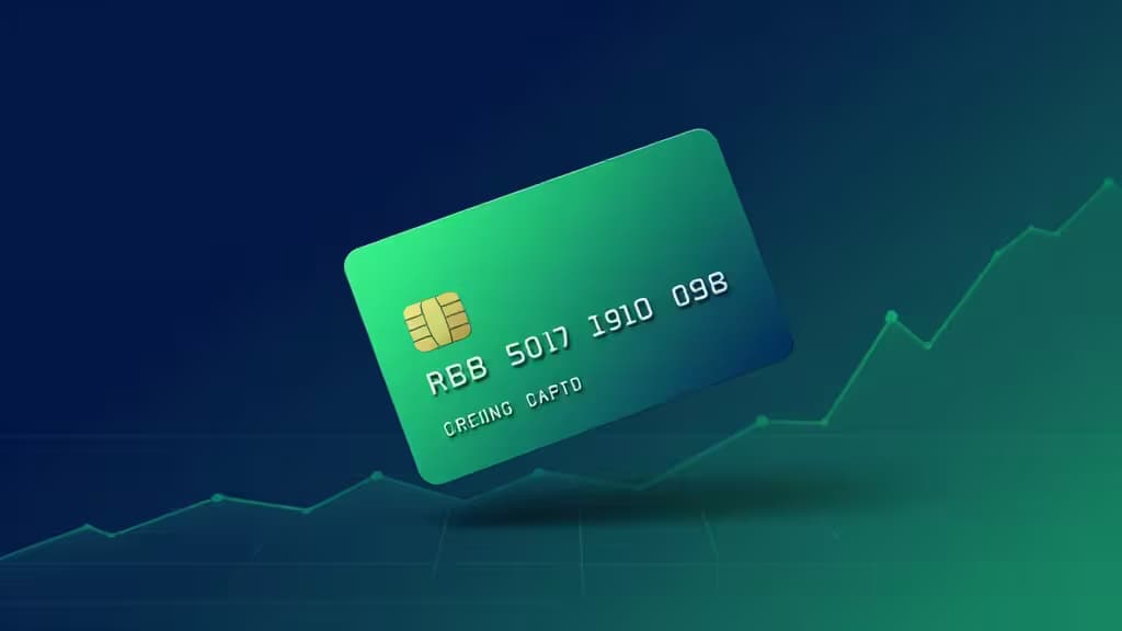 Carta di credito business verde sospesa con chip e numeri, su sfondo blu scuro con grafico finanziario in crescita.