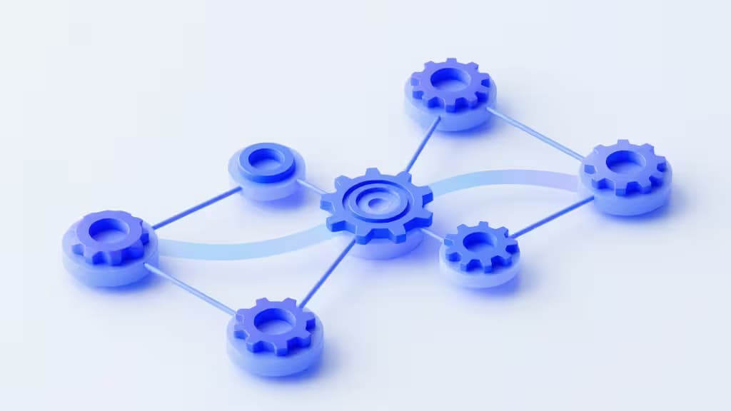 Blue plastic gears interlock on a white surface, symbolizing automated CI/CD workflows for Python projects.